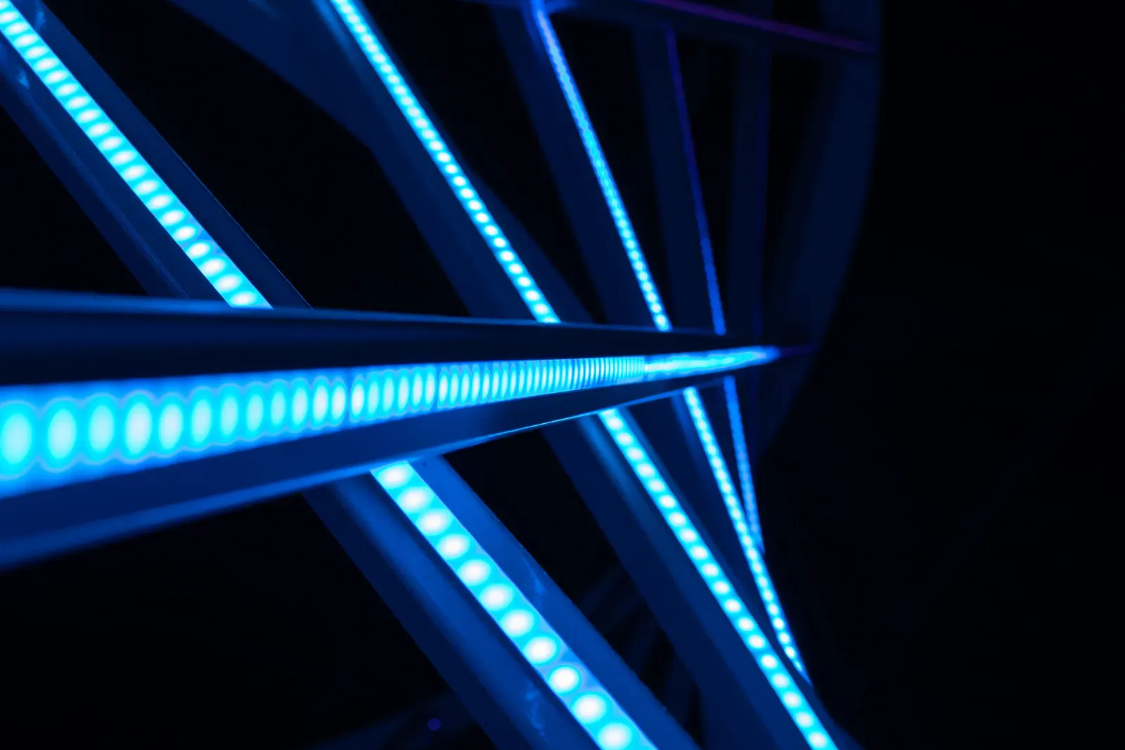 Blue LED light strips crossing a black field