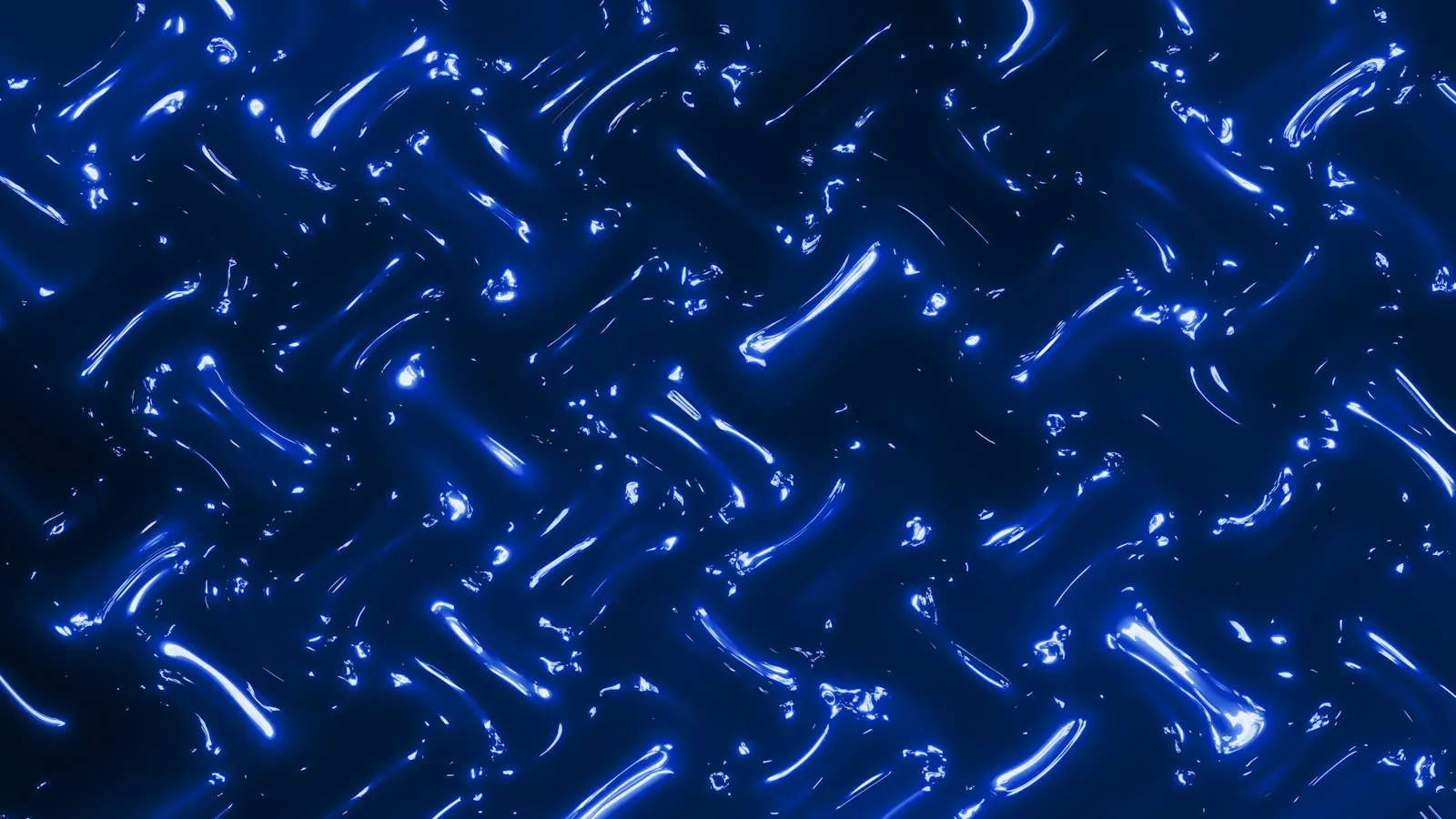 Abstract blue light streaks moving across a dark surface